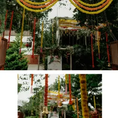 A closer look at the entrance decor, with hanging marigold strings and brass bells creating a festive and welcoming atmosphere.