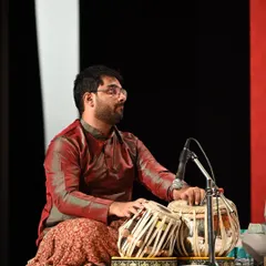 Performing on stage with my tabla set, miked and ready. This was from a concert with Pandit Jayateerth Mevundi, where my role was to provide a solid rhythmic foundation for his vocal artistry.