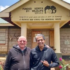 With Brother Colm O'Connell at St. Patrick's High School in Iten, Kenya. He was very curious to learn about how I use technology in my training programs.
