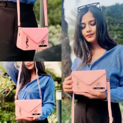 Here is my personalized envelope sling bag in baby pink, shown in action. You can customize it with a name and two charms of your choice, making it a unique and stylish accessory for everyday use or a special gift.