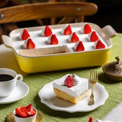 A Tres Leches cake for The Big Chill Cafe UAE, shown as a whole tray and a single slice. This helps customers visualize both individual portions and larger orders.