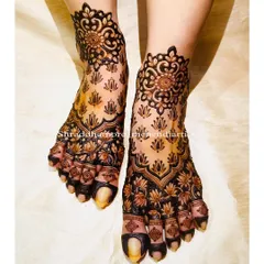 My love for lotus designs is never-ending. This feet mehendi features a beautiful mandala at the ankle with delicate lotus buds scattered across the foot.
