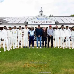 The full touring party, including players from both teams, in front of the St George's Oval pavilion. These tours are about competition on the field and friendship off it.