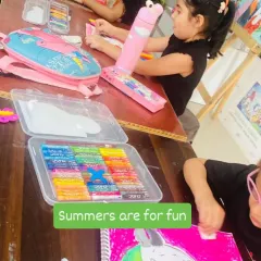 Our classroom is always buzzing with happy energy. This is a typical day at our summer art camp, where kids are busy with their oil pastel drawings. I believe in creating a fun, supportive space where every child feels comfortable to explore and create at their own pace.