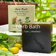 Our Herb Bath Soap is a blend of nature's best healers: Neem, Tulsi, and Aloe Vera. This bar is naturally antibacterial and soothing, perfect for all skin types, especially during monsoon season.