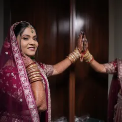 A happy bride seeing her final look. This is the moment I work for, ensuring every bride feels confident and beautiful.