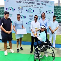 Another angle from the DLTA Wheelchair Tennis Tournament awards ceremony, capturing the pride and accomplishment of our singles winner. These moments fuel our collective drive for excellence.