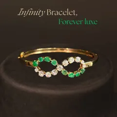Luxe is not loud; it is subtle and infinite, just like this bracelet. Featuring emeralds and diamonds in an infinity design, it is a reflection of love, strength, and grace that lasts forever.