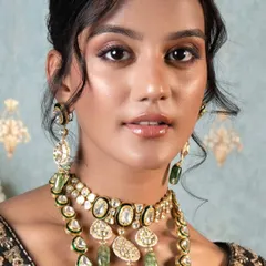 For this Om Jewellers campaign, I styled an elegant polki set with green accents. The look was designed for a cocktail event, showing how traditional pieces can be styled for contemporary occasions.