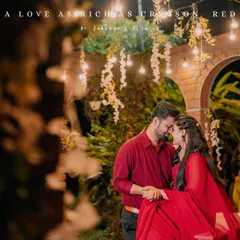 Color is a powerful storytelling tool. This pre-wedding shoot under a canopy of lights showcases our approach to creating a rich, romantic atmosphere using bold colors like crimson red and warm, ambient lighting for a truly cinematic feel.