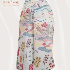 A side view of the landscape-embroidered open Jodhpuri, showing how the colorful design flows around the sleeve and body.