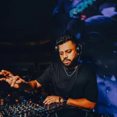 Behind the energy is pure focus. Here I am in the zone, mixing tracks and reading the room to build the perfect vibe. My sets are a blend of hip hop, house, techno, UK Punjabi, and Bollywood, all curated live.