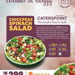 The Chickpeas Spinach Salad is a refreshing and nutritious option, exclusive on Swiggy. It's packed with 26.2 grams of protein and features crisp lettuce, tangy sumac, chickpeas, and spinach, all for just 506 calories.