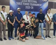 Celebrating our winners at the CISCE Regional Table Tennis Tournament. This group photo shows our champions from the Under 14 and Under 19 boys' teams, along with their coaches, holding the team event trophy.