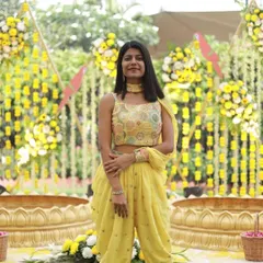 Dressed in yellow for a "Phoolon ki Rasleela" Haldi theme. I always coordinate my outfit with the event's theme to add to the visual appeal of the ceremony.