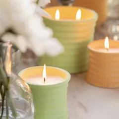 The Daydream collection is designed to inspire. The simple, elegant ceramic vessels in soft pastel colors like green and yellow add a touch of calm to any surface. The Gardenia Delight fragrance fills the air with a sense of ethereal bloom.