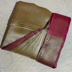 This is the beautiful result of my box folding technique on a rich Kanchipuram silk saree. The pleats are perfectly set and the saree is kept compact and crease-free, ready for any occasion.