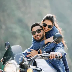 Capturing the fun and adventurous spirit of a couple on a Royal Enfield. We love creating these dynamic, high-energy shots on the scenic roads around Rishikesh, perfect for couples who want a touch of filmi style in their pre-wedding shoot.