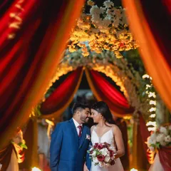 The final result is a groom who looks confident and radiant next to his partner. This romantic shot captures the couple looking their absolute best during their wedding celebration.