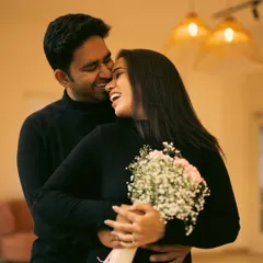 In our Bangalore studio, we create a relaxed space where you can just be yourselves. This candid shot, full of laughter and warmth, is a perfect example of how we capture your natural connection without any awkward posing.