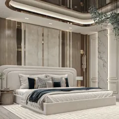 Elegance defined in this bedroom with a mix of textures. It features a cream upholstered headboard, vertical wall panels with metallic accents, and a curved false ceiling design with recessed lighting.