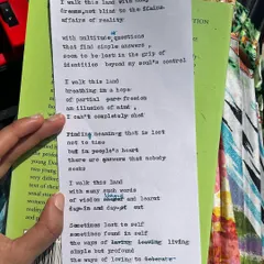 This is a poem I typed out, full of my thoughts on walking through life with hope and finding answers in people's hearts. Holding these typed words, with their little imperfections, feels so much more real than seeing them on a screen.