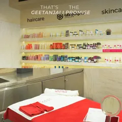 A glimpse into our treatment room, where everything is prepared for your arrival. The clean lines, neatly arranged skincare products, and plush treatment bed embody our promise of a premium, relaxing service.