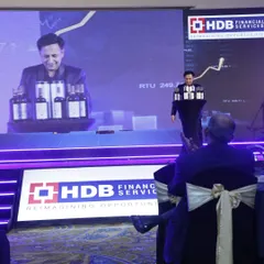 Performing a production illusion for HDB Financial Services. This act is about creating abundance from nothing, a fitting theme for a financial celebration.