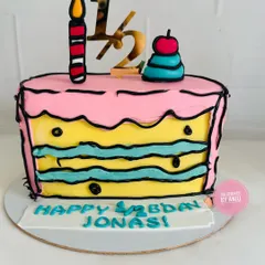 Celebrating a half birthday with this fun and quirky comic-style cake. This unique design makes the six-month milestone feel extra special.