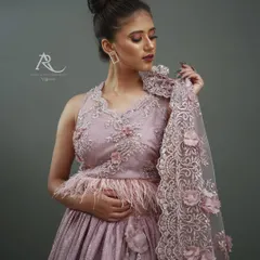 A three-quarter shot like this allows us to focus on the bodice and the intricate details of the garment. I directed the model to hold the delicate, lace-edged dupatta to showcase its texture and the 3D floral appliqué work.