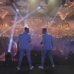 Facing a sea of happy faces is what we live for. This shot captures the moment we connect with the crowd, turning a beautiful wedding reception into a full-blown concert experience with epic lighting and sound.