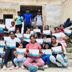 The 'Mom & Me' group proudly displaying their completion certificates. We celebrate every participant's achievement at the end of a rewarding day.