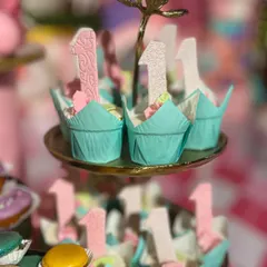 Every detail matters. For this first birthday, I created custom cupcakes with edible "1" toppers, ensuring even the smallest desserts fit the grand carnival theme.