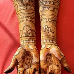 This portrait mehndi captures the royal look of the bride and groom. I can work from your photos to create a realistic and artistic representation, including details like their outfits and the couple's initials.