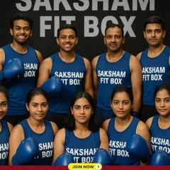 Join our power squad. This team photo captures the spirit of our community, a diverse group of men and women united by their commitment to getting fit and strong together at Saksham Fit Box.