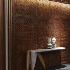 We believe in reviving heritage crafts within contemporary contexts. For this dining room, we commissioned intricate Pinjirakari lattice work, transforming the walls and ceiling into a jewel box that filters light and creates an atmosphere of intimate, handcrafted luxury.