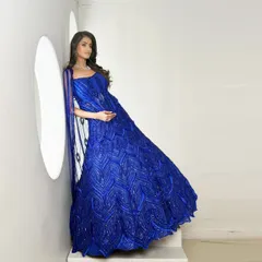 Bold, electric, and unforgettable. This electric blue bridal lehenga brings the drama with intricate, all-over embellishments and a flowing dupatta for a bride who dares to stand out.