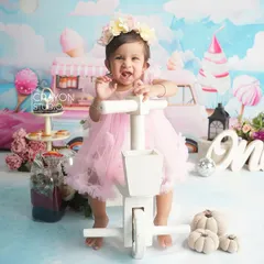 The first birthday is a whirlwind of joy. This Candyland theme captures the pure, sweet excitement of turning one, complete with a custom backdrop, props, and plenty of room for happy wiggles.