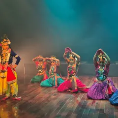 Dancers portraying the gopis with Krishna in a scene from our performance at Jagriti Theatre. The vibrant costumes and expressive postures bring the stories you grew up with to life right before your eyes.