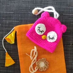 Our Rakhi goodie bags are ready. This one features a cute owl key cover and a handmade rakhi, all packed in a reusable cloth pouch.