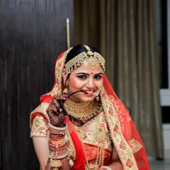A playful and confident bride, posing with her sunglasses. We love it when brides show their personality in their portraits.