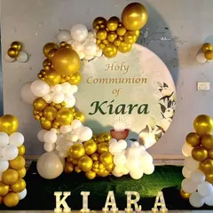 The full view of the Holy Communion decoration, including light-up letters spelling the child's name.