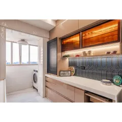 A closer look at the details in this cappuccino kitchen. The deep blue picket-style backsplash tiles add a beautiful pop of color and texture. The overhead cabinets feature a warm, backlit panel, perfect for adding ambiance in the evening.