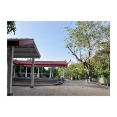 A view of the extended pavilion and courtyard area. This new addition was designed to complement the original structure, providing a modern functional space while respecting the architectural language of the past.
