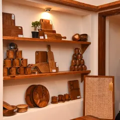 A glimpse of the smaller wooden items available at my studio. I craft everyday essentials like cutting boards, mugs, and bowls from teak, designed for daily comfort and beauty.