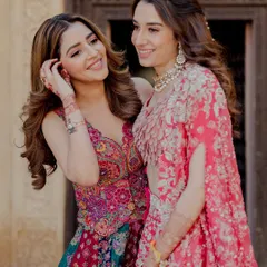 Coordinated sister styling is about harmony, not just matching. For these sisters, I selected two distinct Mrunalini Rao ensembles that share a poetic, celebratory feel. The result is a beautiful story of individual style and shared moments, perfect for the bride and her closest confidante.