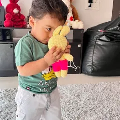 A precious moment between a child and his toy. These are the moments I crochet for.