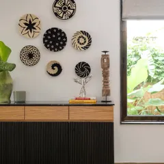 In our Villa Shai project, this custom-designed console and curated decor tell a story of local Goan craft and conscious living. We believe furniture should be more than functional; it should be a collection of stories, textures, and memories that ground a space with soul and a sense of place.