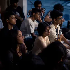 An audience of music lovers, completely captivated by the performance. This is the community we've built: supportive, engaged, and passionate about music.