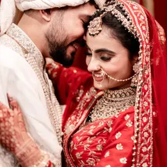 Finding a quiet moment of togetherness amidst the celebration. This is the heart of your wedding day story, a gentle embrace that speaks volumes.